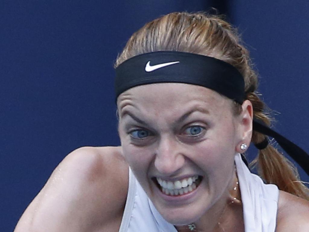 Petra Kvitova, of the Czech Republic, returns a volley to Caroline Garcia, of France, during the Miami Open tennis tournament, Monday, March 25, 2019, in Miami Gardens, Fla. (AP Photo/Joel Auerbach)