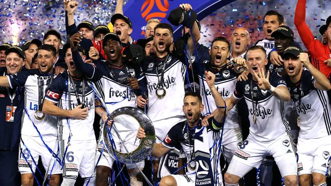 Melbourne Victory players celebrate winning the 2018 A-League Grand Final