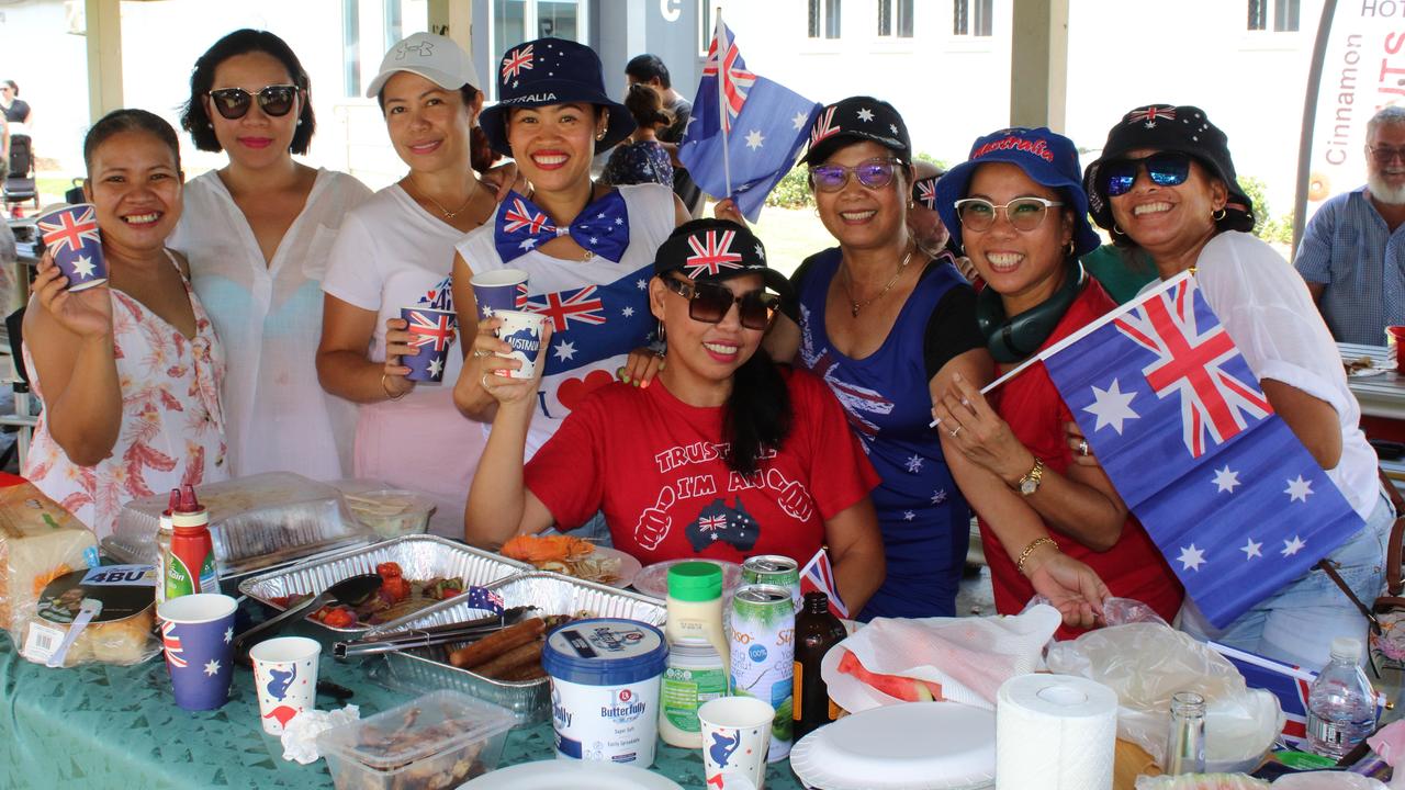 TheÂ â&#128;&#152;Beshie Groupâ&#128;&#153;, a gathering of the local Filipino community, laying out a sumptuous feast adorned with Australian flags.