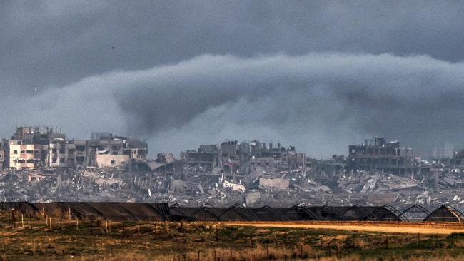 Smoke billows over the northern Gaza Strip during Israeli bombardment from southern Israel.