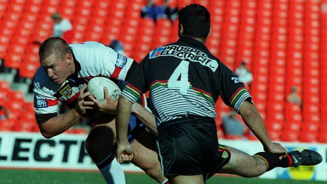 Kevin Campion (left) playing for Gold Coast in 1995.