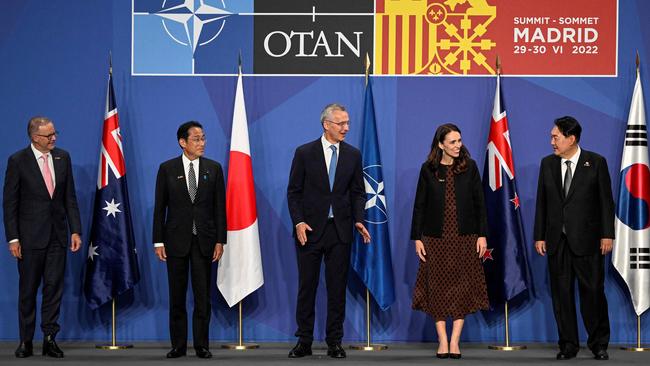 The Asia-Pacific Four, or AP4, comprises the prime ministers of Australia, Japan and New Zealand, and South Korea’s president. NATO secretary-general Jens Stoltenberg is pictured centre. Picture: AFP