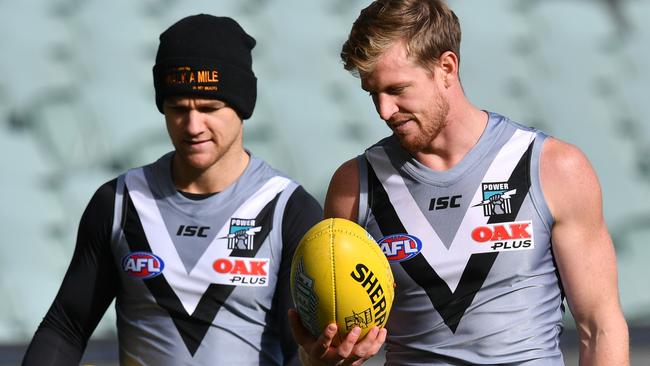 Port Adelaide star Robbie Gray, left, with the in-form Tom Jonas. Picture: AAP Image/David Mariuz