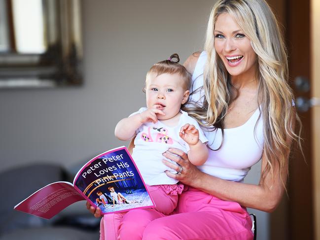 Brooke La Pia with her one year old daughter Alessandra and the children book she wrote and published Titled Peter Peter Loves His Pink Pants Thursday ,October,8,2020.Picture Mark Brake