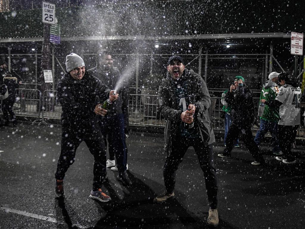 Philadelphia's Wild Celebration: Champagne, Fireworks, and Climbing Poles