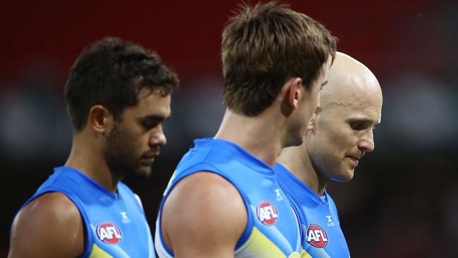 Gary Ablett looks dejected as he walks from the field after defeat in the round two AFL match between the Greater Western Sydney Giants and the Gold Coast Suns. Picture: Mark Metcalfe