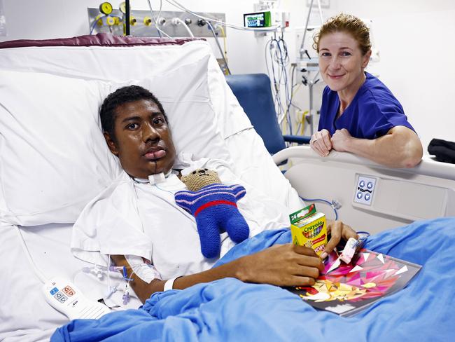 Ronny, who is 16-years-old from the Solomon Islands with the surgeon who removed his tumour, Professor Raewyn Campbell. Picture: Sam Ruttyn