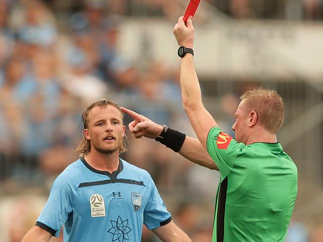 Referee Kurt Ams sends Rhyan Grant off against Melbourne City. Picture: Getty Images