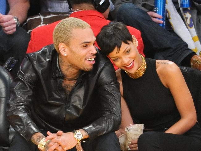 Former flame ... Chris Brown (L) and Rihanna attend a basketball game in 2012.
