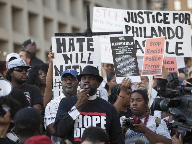 People rally to protest the deaths of Alton Sterling and Philando Castile. Picture: AFP/Laura Buckman