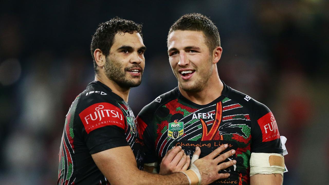 SYDNEY, AUSTRALIA - AUGUST 14: Greg Inglis (L) and Sam Burgess (R) of the Rabbitohs celebrate victory at the end of the round 23 NRL match between the South Sydney Rabbitohs and the Brisbane Broncos at ANZ Stadium on August 14, 2014 in Sydney, Australia. (Photo by Matt King/Getty Images)