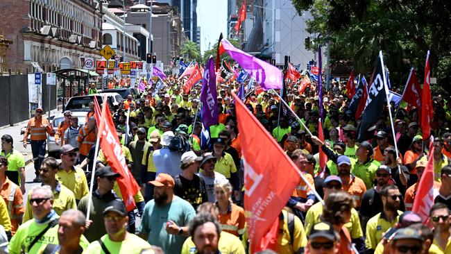 CFMEU workers line the streets near Parliament House in Brisbane. Picture: Dan Peled / NCA NewsWire