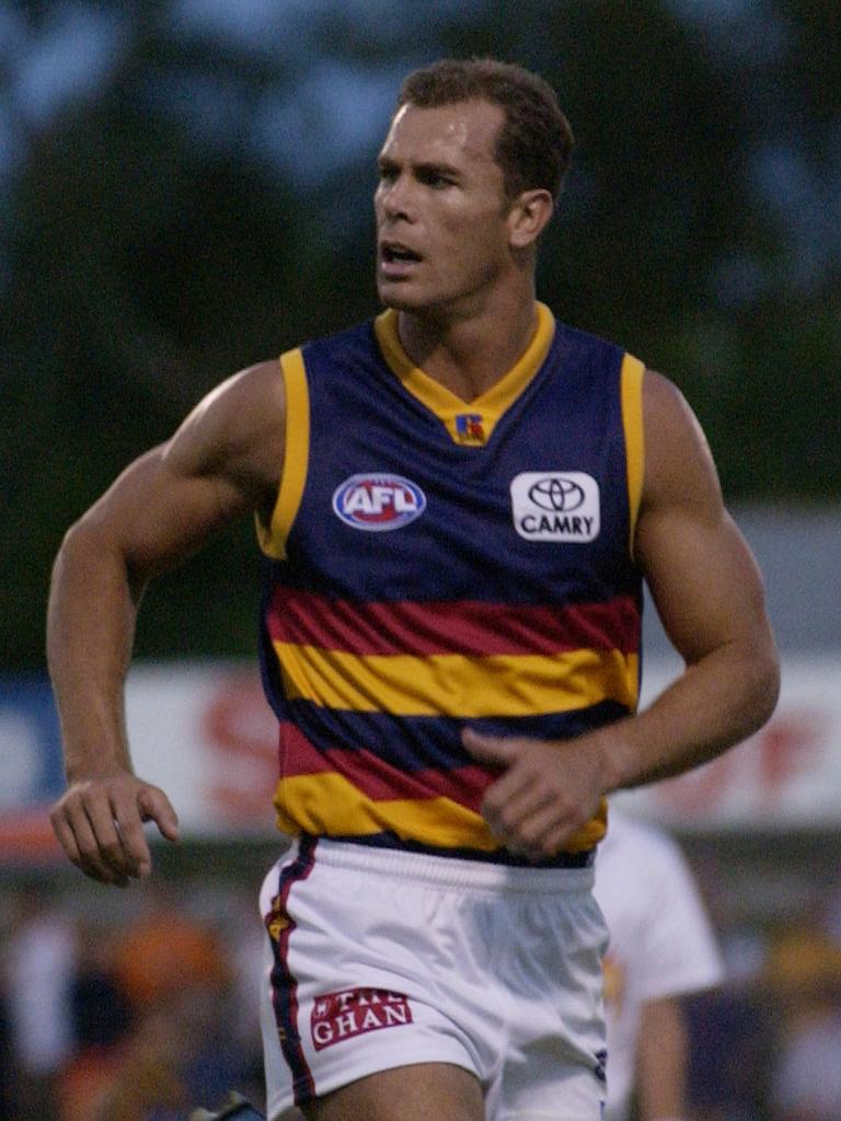 Carey in action for the Crows in 2003. Photo: AAP Image/Tom Miletic