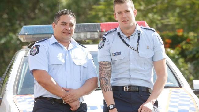 DUTY HURTS: Police constables Mathew Timoti and Peter Boyle..