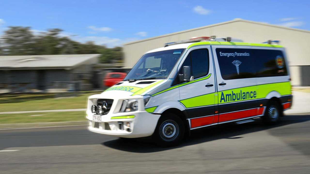 Woman hospitalised after car, bike crash | The Courier Mail