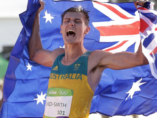 Dane Bird-Smith, of Australia, celebrates his bronze medal performance in the Mens 20 K race walk at the 2016 Summer Olympics in Rio de Janeiro, Brazil, Friday, Aug. 12, 2016. (AP Photo/Robert F. Bukaty)