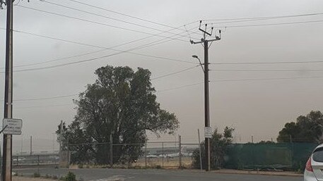 Smoke from the bushfires seen over Adelaide Airport. Picture: Jenny Myers