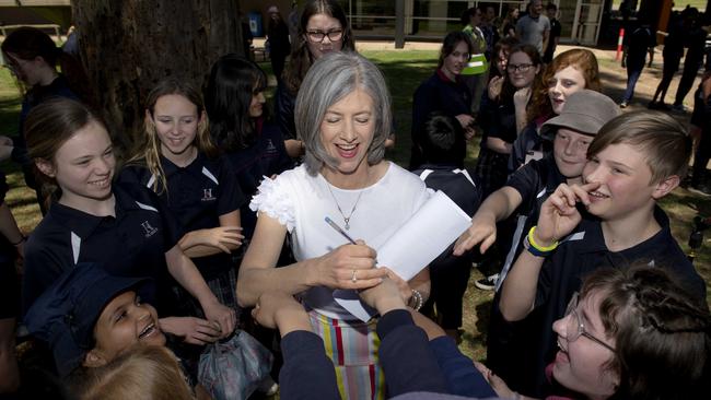 Professor Nicola Spurrier signs autographs and speaks to students at The Heights School in Modbury Heights after announcing a massive expansion of Covid vaccination hubs at schools. Picture: NCA NewsWire / Naomi Jellicoe