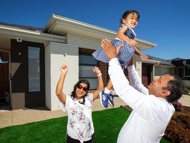 Monty, Jyoti Agrawal and their daughter Aayushi outside their Rockbank house. The Aussie Buyer's Report says the suburb has the best buying opportunities. Picture: Mark Stewart