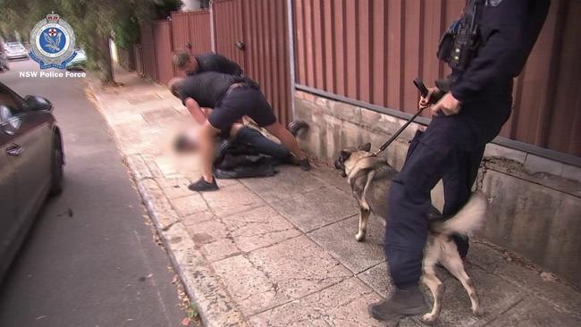 Plain clothes police swoop on Damien Peters in Petersham just before 5pm on Monday. Picture: NSW Police