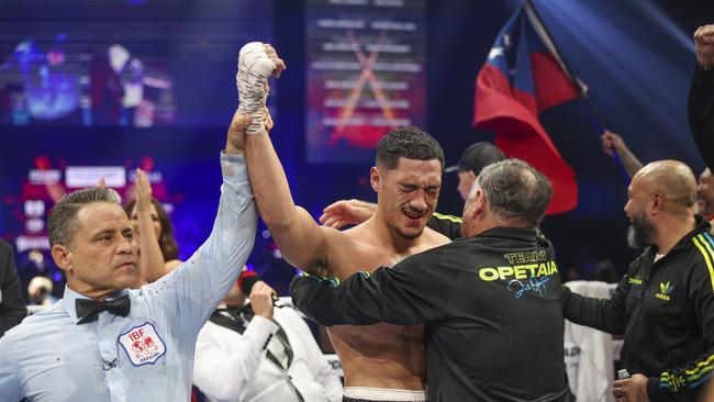 The moment that changed Jai Opetaia’s life as he celebrates victory in his IBF cruiserweight title fight against Mairis Briedis. Picture: Peter Wallis/Getty Images