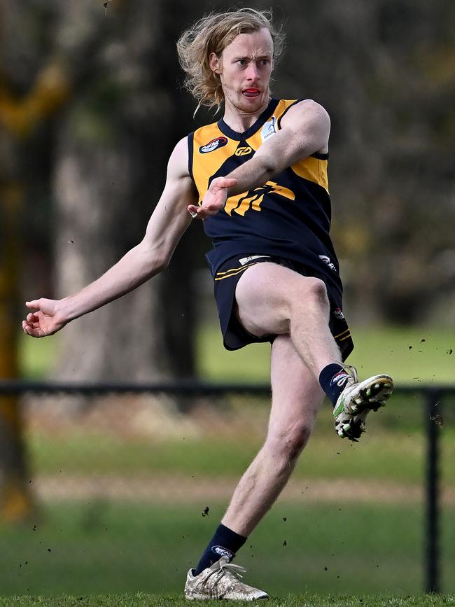 NFL: Whittlesea’s Mitchell Andrews gets a kick. Picture: Andy Brownbill