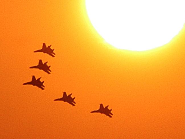 Russian-designed fighters aganst the sun.