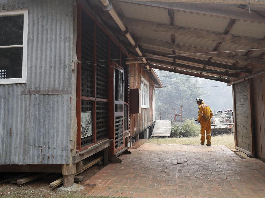 Conducting a back-burn at the top of Donnellys Rd, Geeveston, to protect a house. Picture: RICHARD JUPE