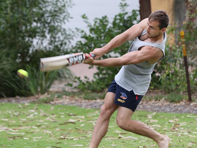 Richard Douglas swings for the fence. Picture: Tait Schmaal