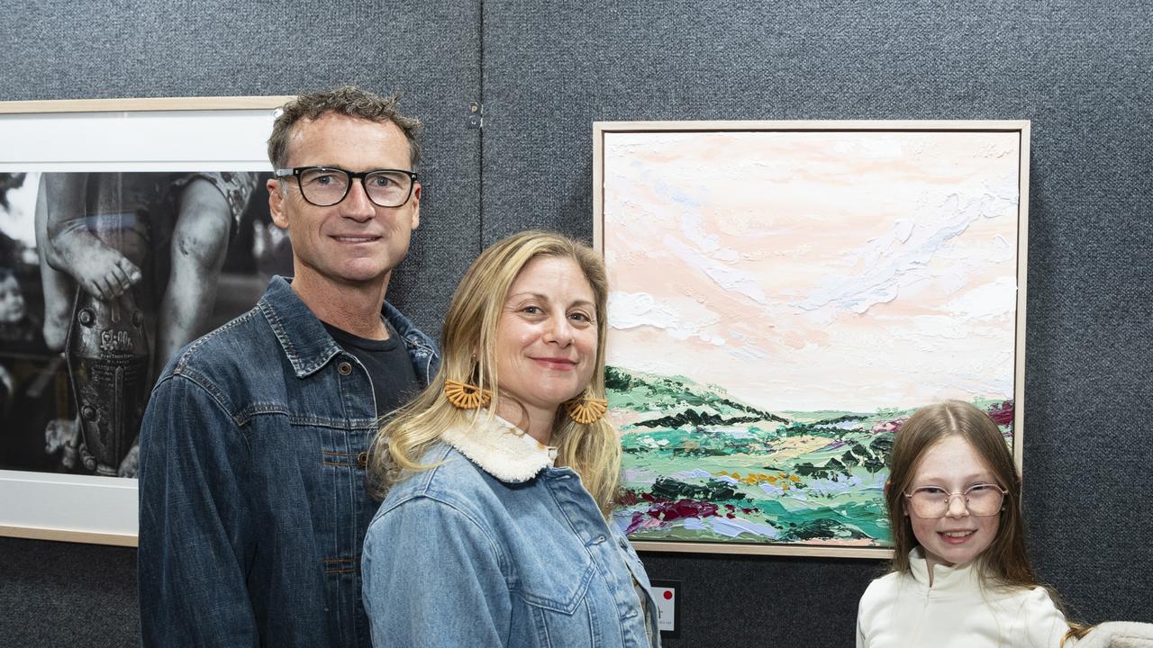 Hayden and Nicola Phoenix with daughter Alaya at Fairholme Open Art Prize FACETS exhibition, Friday, May 10, 2024. Picture: Kevin Farmer