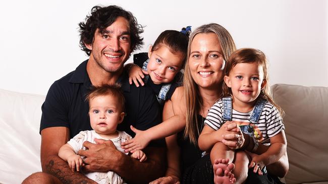 Johnathan Thurston at home with wife Samantha and daughters Lillie, 1, Frankie, 5, and Charlie, 3. Picture: Zak Simmonds