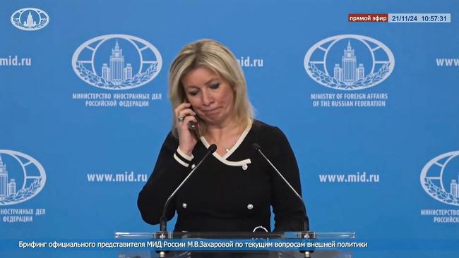 A TV grab taken from handout footage released on November 21 by the Russian Foreign Ministry shows Russia's foreign ministry spokesperson, Maria Zakharova, receiving a phone call during a live press briefing ordering her not to comment on reports of a ballistic missile strike on Ukraine. Picture: Russian Foreign Ministry/AFP