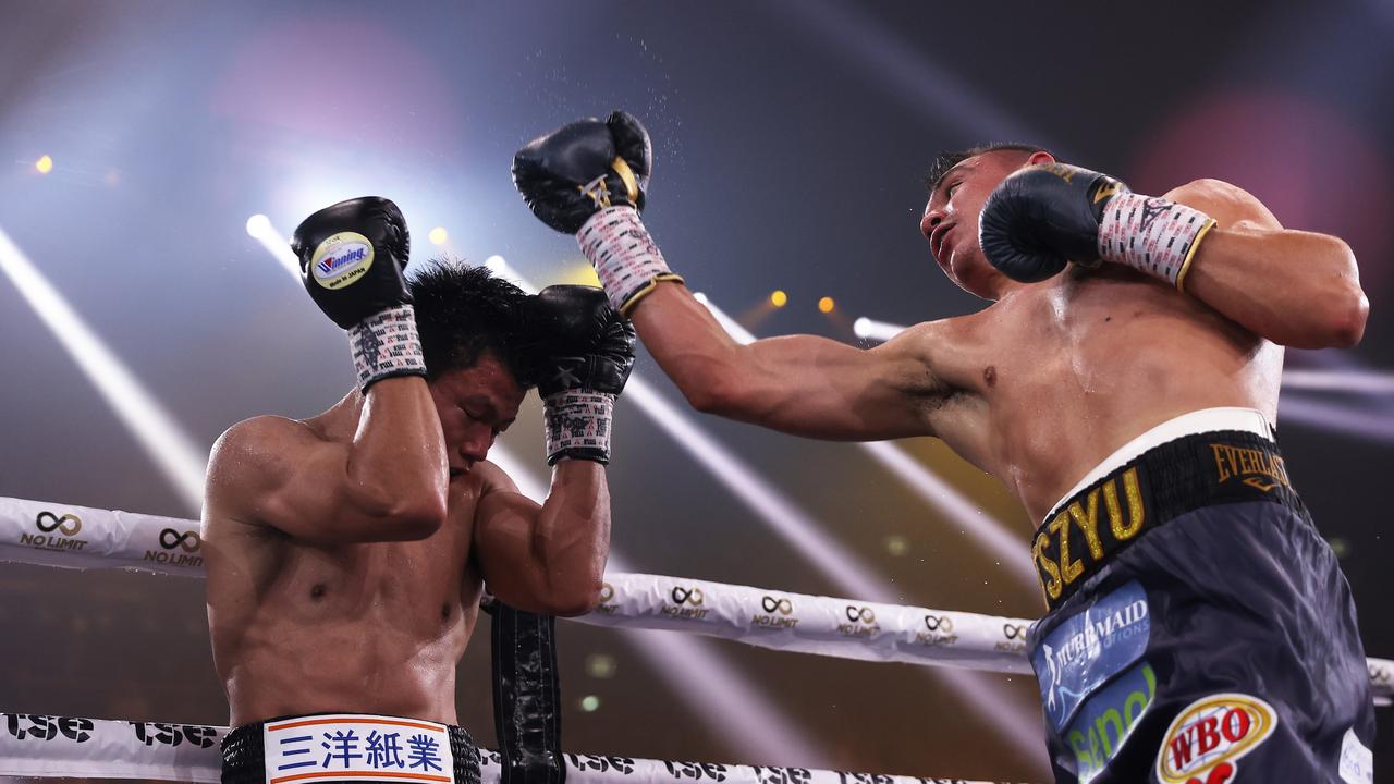 SYDNEY, AUSTRALIA - NOVEMBER 17: Tim Tszyu punches Takeshi Inoue during the WBO Global and Asia Pacific Super Welterweight title bout between Tim Tszyu of Australia and Takeshi Inoue of Japan at Qudos Bank Arena on November 17, 2021 in Sydney, Australia. (Photo by Mark Kolbe/Getty Images)