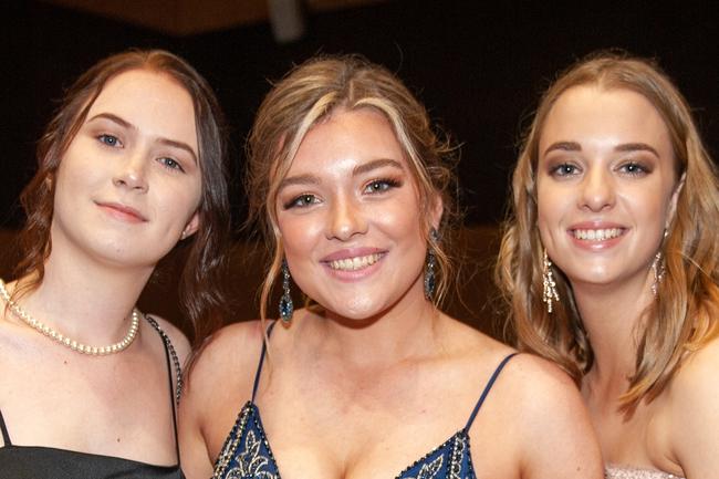 Camil Roux, Emily Whiting and Meghan McCartney at St Patrick's formal, July 30, 2022. Picture: Michaela Harlow