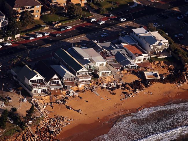 Collaroy Beach pictured from the sky after some huge storms 6 days ago. Destroyed houses pictured on the becah front.