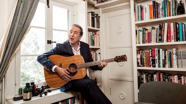 Eric Idle strumming at home. Picture: Robyn Von Swank