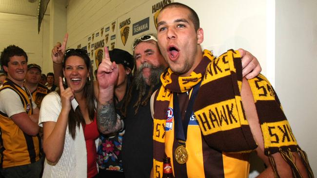 Lance Franklin with his father Lance and sisters Bianca and Bree after Hawthorn's win against Geelong in the 2008 AFL Grand Final. Picture: News Corp Australia