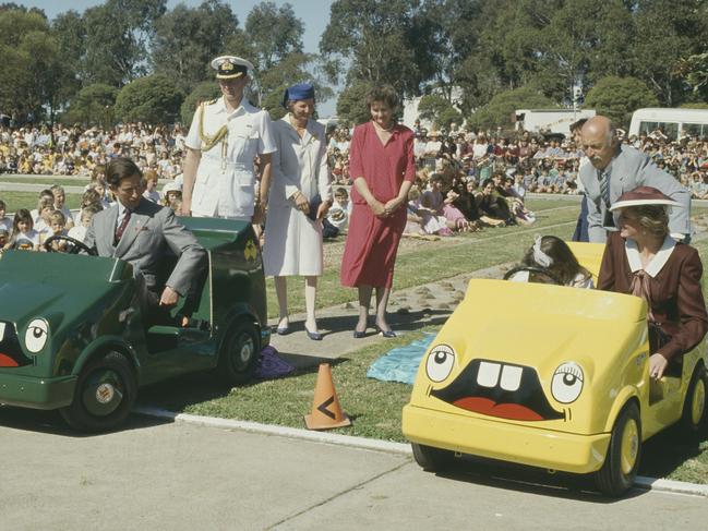 There have been some odd moments over the years. Prince Charles and Princess Diana, visit a road safety centre in Shepparton to see the Careful Cobber children's driving program in action, October 1985. Picture: Jayne Fincher/Princess Diana Archive/Getty Images