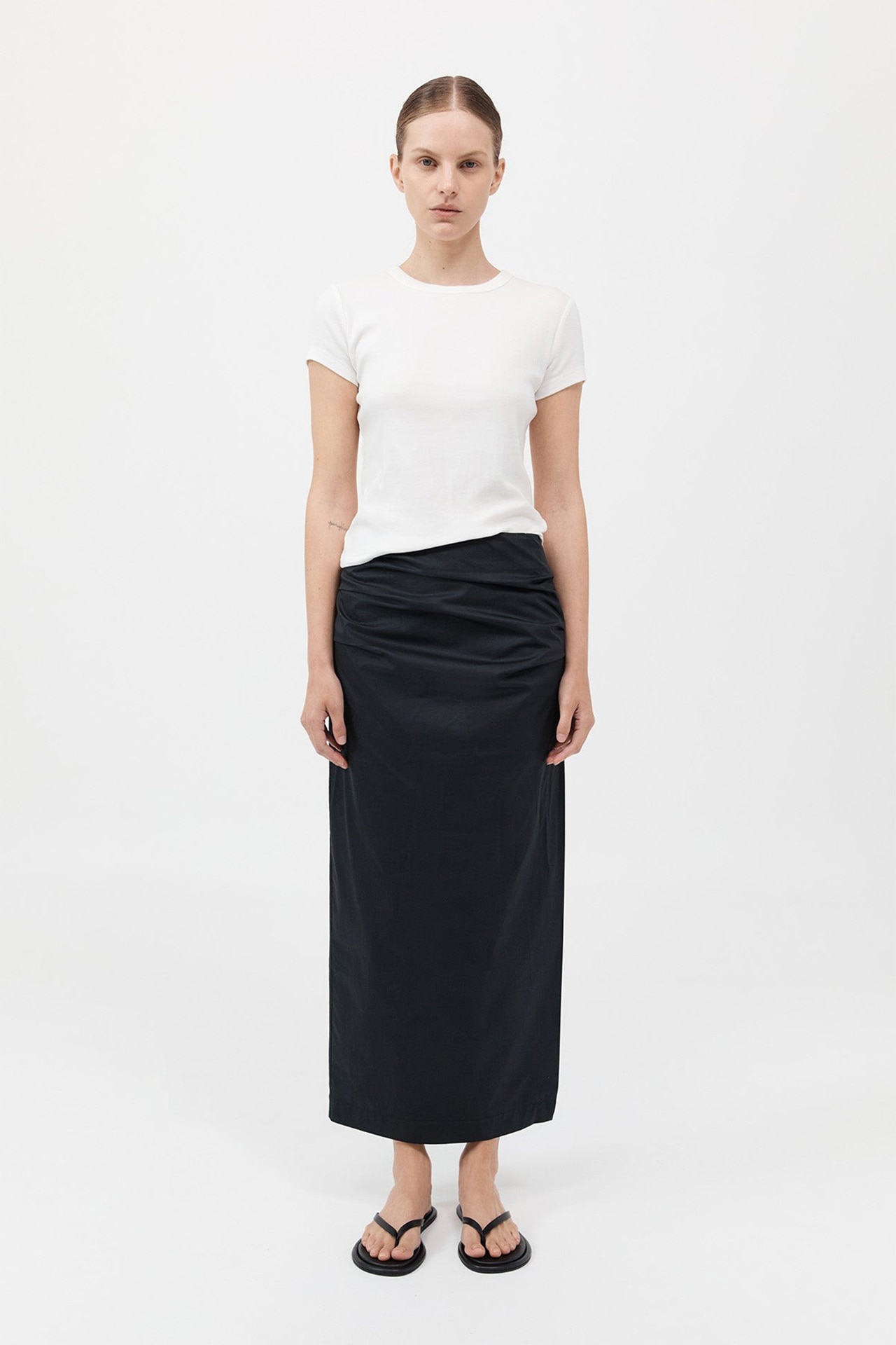 <h3><a href="https://www.st-agni.com/" target="_blank" rel="nofollow noopener"><b>St. Agni</b></a></h3><p><strong>Cotton Tuck Midi Skirt</strong></p><p>This midi from St. Agni is the kind of skirt you can throw on and still manage to look sleek enough for the summer office. The effortless draped silhouette, low rise waist and side split make it particularly suitable for the summer&mdash;and the front tuck detail is a sartorial bonus. All you&rsquo;ll need is a work bag.</p><p><b>Type: </b>Skirt |<b> Material: </b>100 per cent cotton |<b> Colour: </b>Moss grey, black | <b>Delivery:</b> Free over $200</p><p class="button-common"><a title="Shop now for $379" href="https://www.st-agni.com/collections/skirts/products/cotton-tuck-midi-skirt-black#details" target="_blank" data-cta="Shop now for $379" data-editable="true">Shop now for $379</a></p>