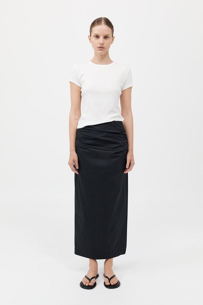 St. AgniCotton Tuck Midi SkirtThis midi from St. Agni is the kind of skirt you can throw on and still manage to look sleek enough for the summer office. The effortless draped silhouette, low rise waist and side split make it particularly suitable for the summer—and the front tuck detail is a sartorial bonus. All you’ll need is a work bag.Type: Skirt | Material: 100 per cent cotton | Colour: Moss grey, black | Delivery: Free over $200Shop now for $249 (was $379)