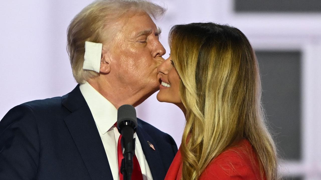 Donald Trump kisses Melania Trump at the Republican convention in July. Picture: Andrew Caballero-Reynolds/AFP