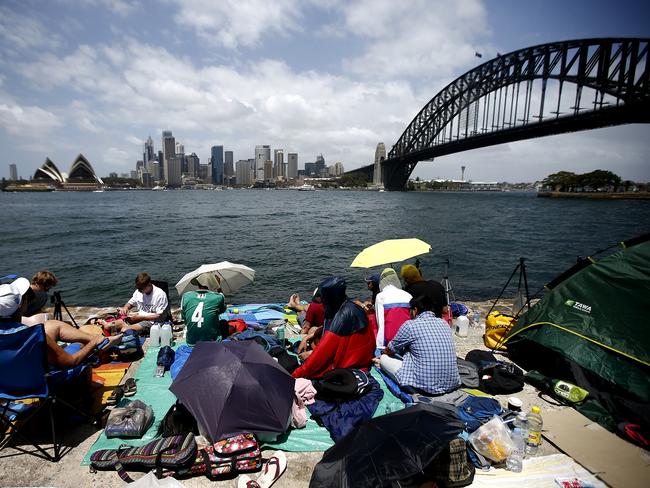 Spectators wait patiently at Kirribilli before the fireworks. Picture: Bradley Hunter