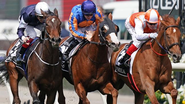 Jockey Craig Williams (right) rides Vow And Declare to victory in race 7, the Lexus Melbourne Cup, during Melbourne Cup Day, at Flemington Racecourse in Melbourne, Tuesday, November 5, 2019. (AAP Image/Scott Barbour) NO ARCHIVING, EDITORIAL USE ONLY