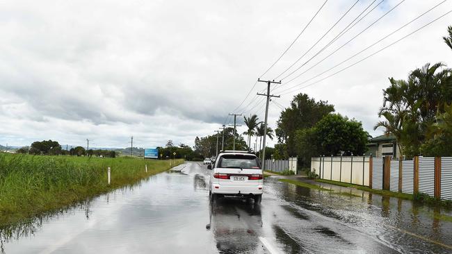 WEATHER: Water is still over parts of David Low Way, Bli Bli. Picture: Patrick Woods.