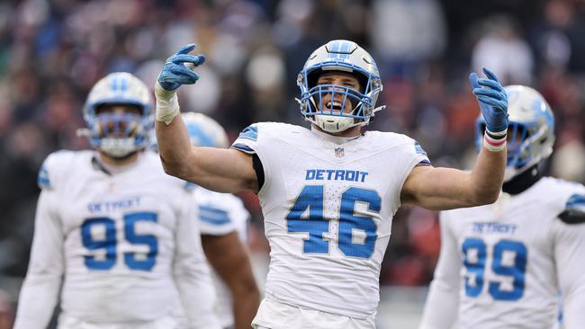 Jack Campbell celebrates after a false start penalty against the Chicago Bears. (Photo by Michael Reaves/Getty Images)