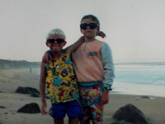 Surfer Mick Fanning (left) and brother Sean at the beach.