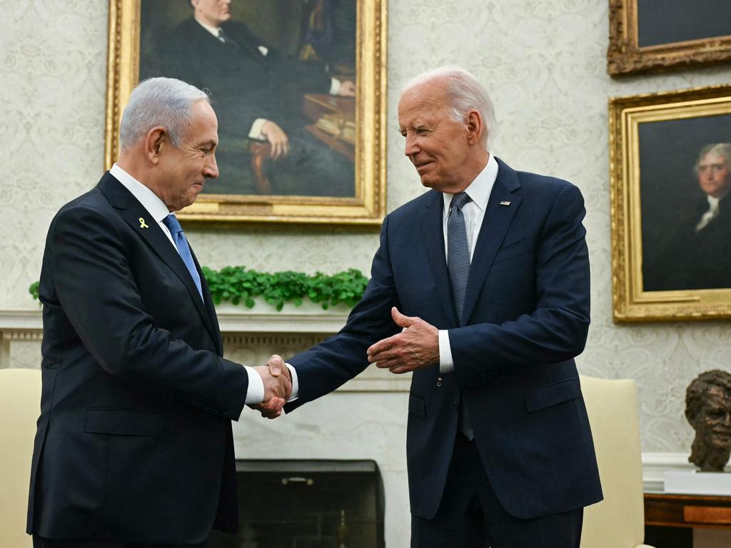 Joe Biden shakes hands with Benjamin Netanyahu during a meeting in the Oval Office. Picture: AFP