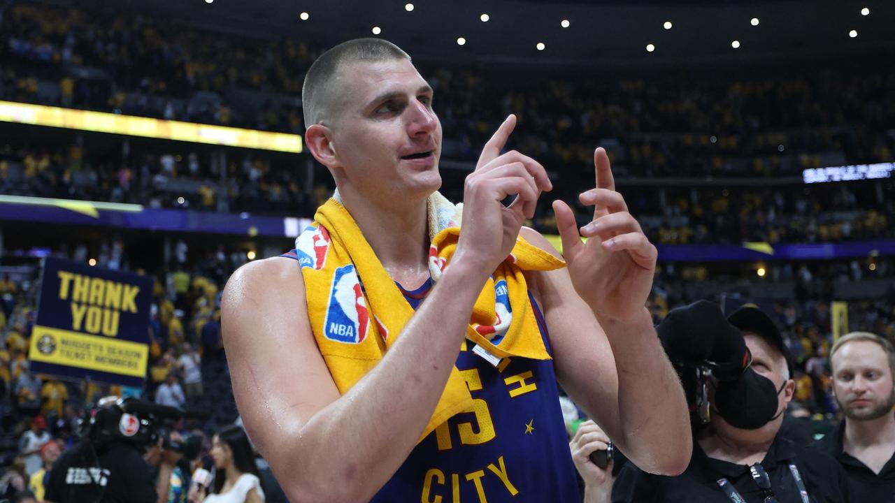 DENVER, COLORADO - JUNE 01: Nikola Jokic #15 of the Denver Nuggets reacts after a 104-93 victory against the Miami Heat in Game One of the 2023 NBA Finals at Ball Arena on June 01, 2023 in Denver, Colorado. NOTE TO USER: User expressly acknowledges and agrees that, by downloading and or using this photograph, User is consenting to the terms and conditions of the Getty Images License Agreement. Matthew Stockman/Getty Images/AFP (Photo by MATTHEW STOCKMAN / GETTY IMAGES NORTH AMERICA / Getty Images via AFP)