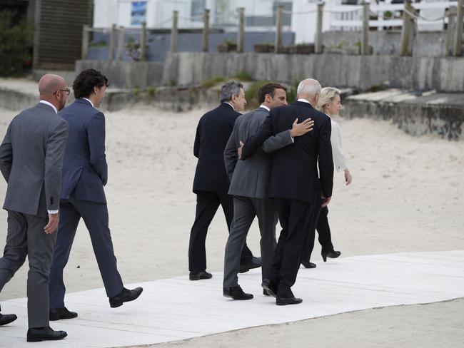 US President Joe Biden and French President Emmanuel Macron walk together in Carbis Bay. Picture: AFP