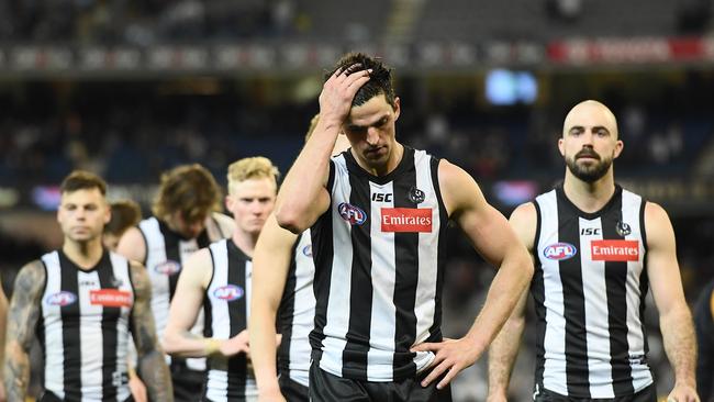 Scott Pendlebury and the Magpies leave the MCG after their shock loss to GWS. Picture: Getty Images